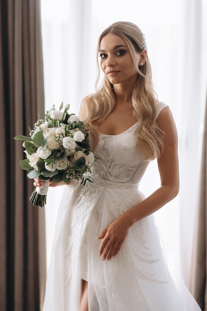 Bride in a white dress holding a bouquet