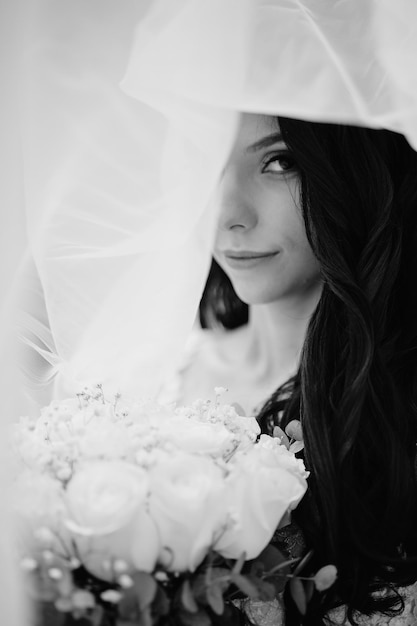 A bride with her veil over her head