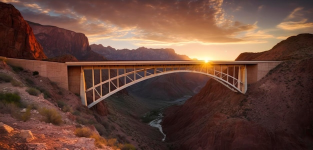 A bridge over a canyon with the sun setting behind it.