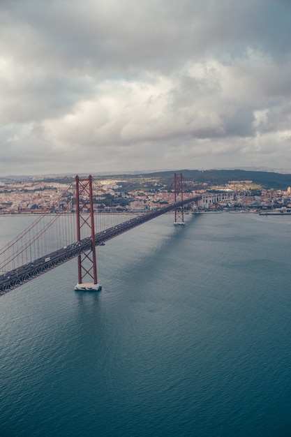 Bridge of lisbon in the middle of the river