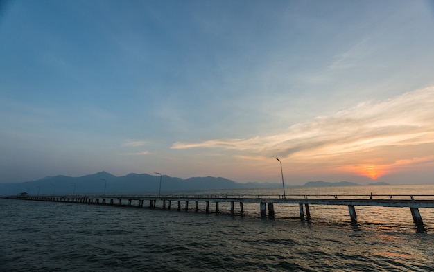 the bridge in the sea at sunrise