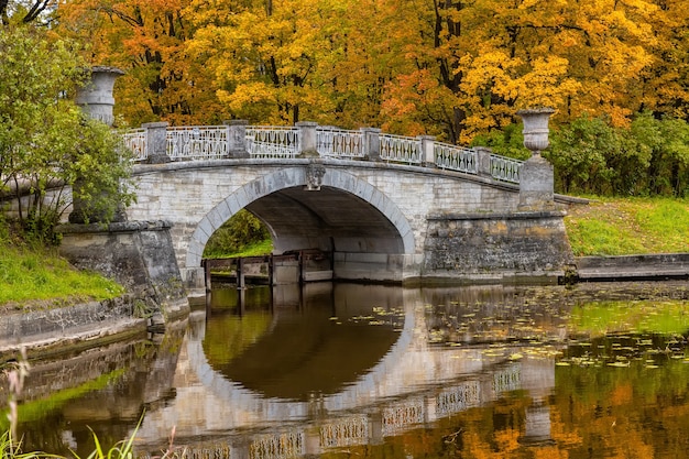 Bridge over Slavyanka river. The Autumn landscape. Pavlovsk Palace Park. Saint-Petersburg, Russia