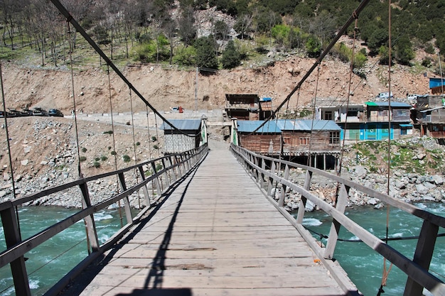 The bridge on Swat river in the valley of Himalayas Pakistan