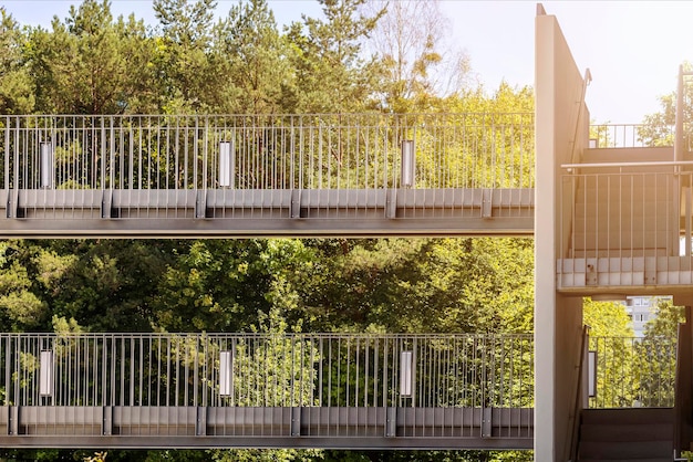 Bridge Transition between Houses with Stairs. Passage Walkway between Modern Apartment Buildings.