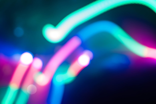 Bright abstract colorful blurred lines from light sources at the party