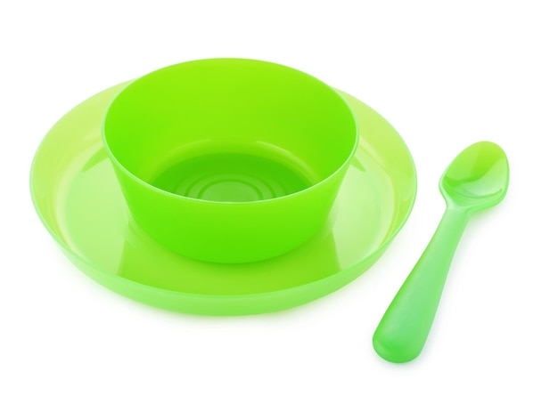 Bright baby tableware on white background