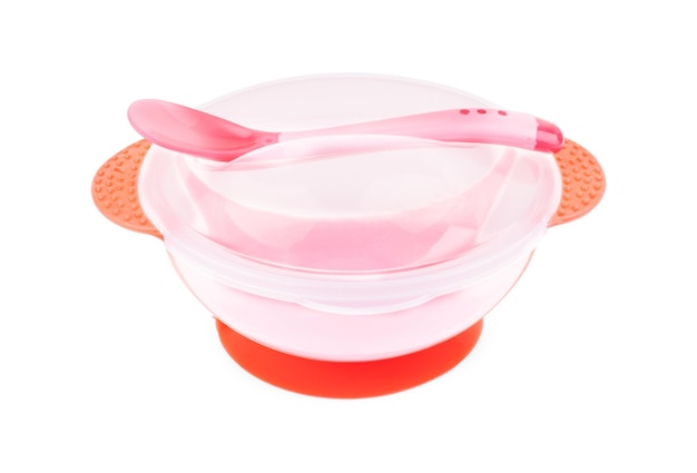 Bright baby tableware on white background