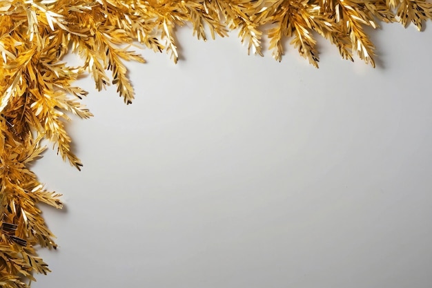 A bright backdrop thinly cut strips of gold foil on a white background shiny metallic tinsel Holiday