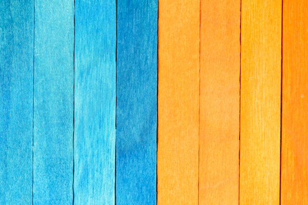 Bright background from blue and orange wooden planks