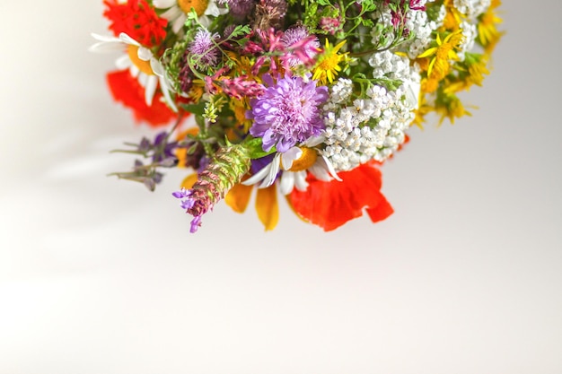 A bright bouquet of summer flowers. Beautiful romantic floral composition.