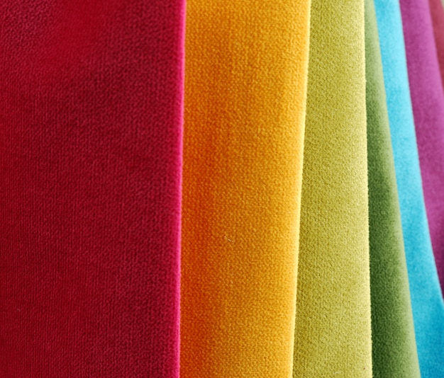 Bright collection of colorful velour textile samples