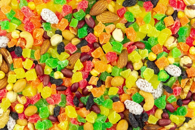 Bright and colorful candied fruits with nuts close-up