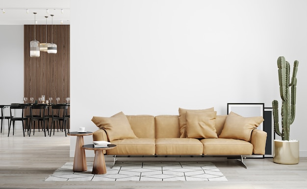 Bright contemporary living room mockup with white wall and wooden floor, leather sofa, plant and coffee table