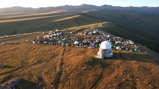 Bright dawn over the observatory in the mountains