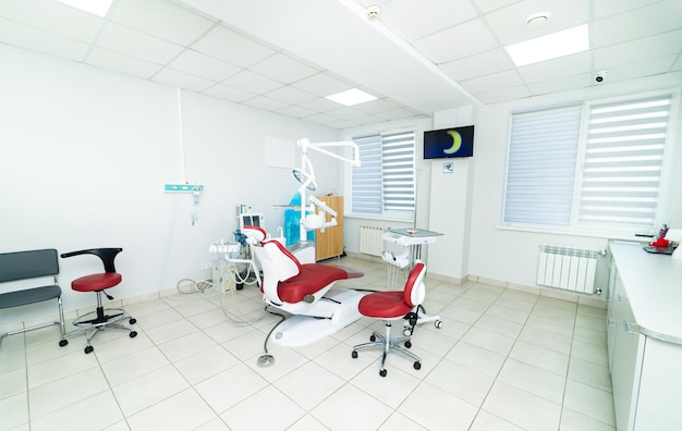 Bright dentel cabinet with sterile equipment Dental treatment in modern hospital