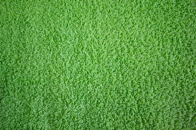 Bright green towel closeup fabric texture