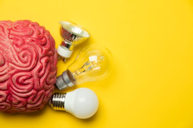 Bright idea Brain with lightbulb inspiration innovation solution concept