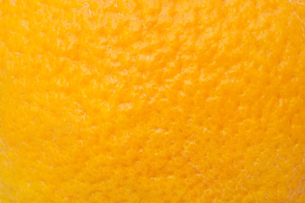 Photo bright orange peel as background texture