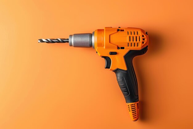 A Bright Orange Power Drill Resting On A Vibrant Surface