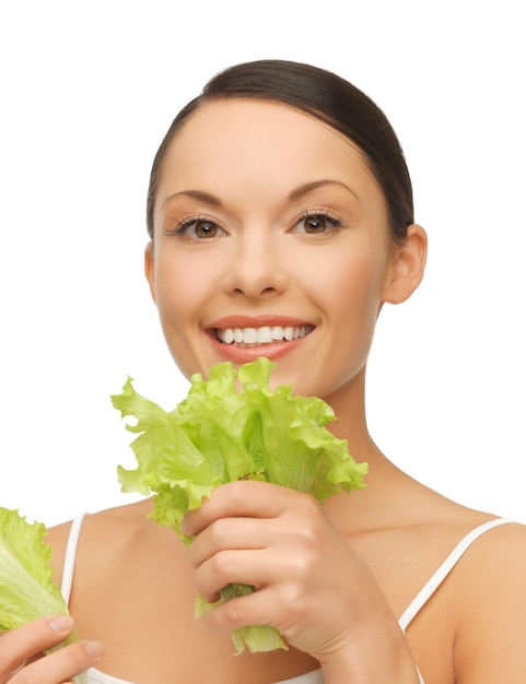 bright picture of beautiful woman with lettuce