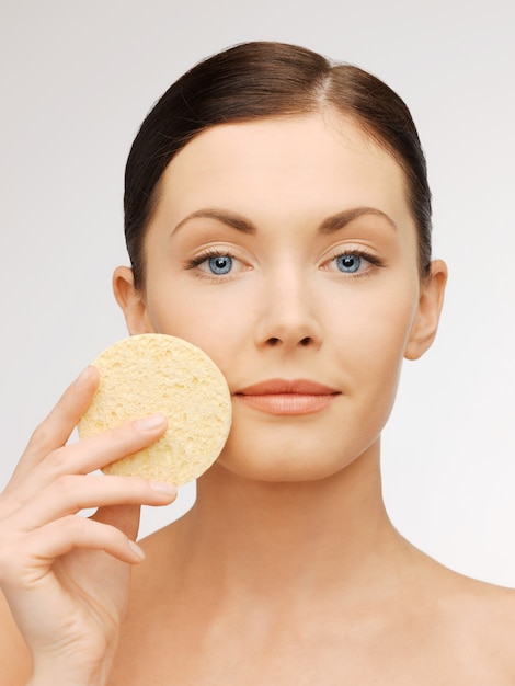 bright picture of beautiful woman with sponge