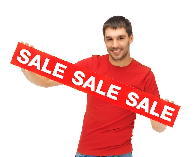 bright picture of handsome man with sale sign.