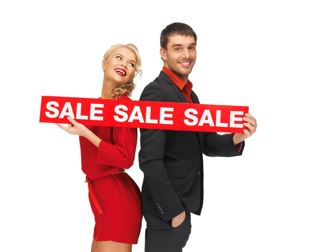 bright picture of man and woman with sale sign