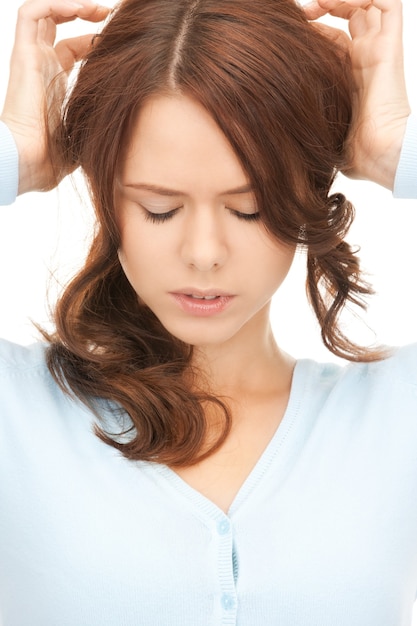 bright picture of unhappy woman over white