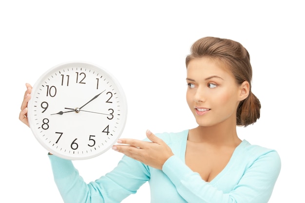 bright picture of woman holding big clock