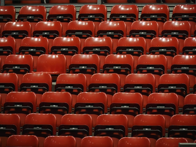 Bright red stadium seats on the stand