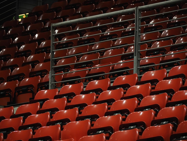 Bright red stadium seats on the stand