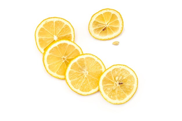 Photo bright ripe sliced lemon isolated on white background