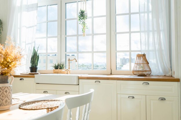 Bright spacious dining room with wooden big table