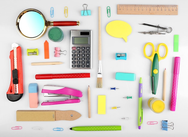 Bright stationery objects on table close up