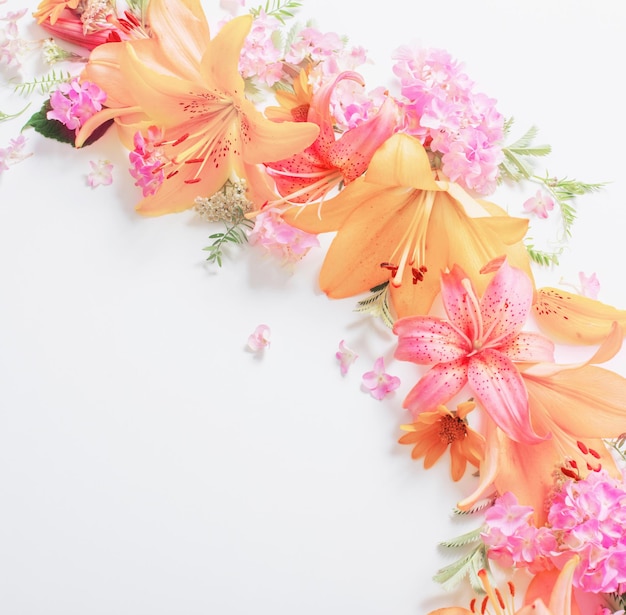 Bright summer flowers on white background