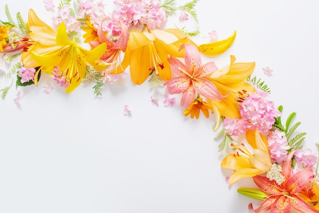 Bright summer flowers on white background