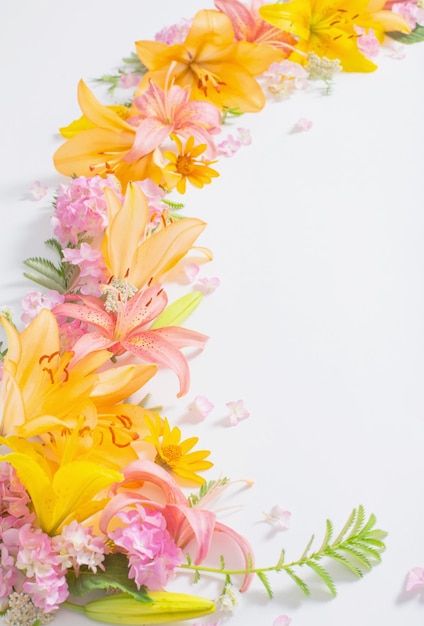 Bright summer flowers on white background