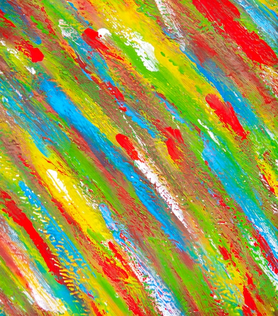 Bright variegated multicolored background of brush strokes with different paint