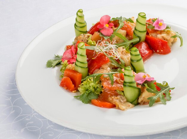 Bright vegetable salad with tofu and rice chips