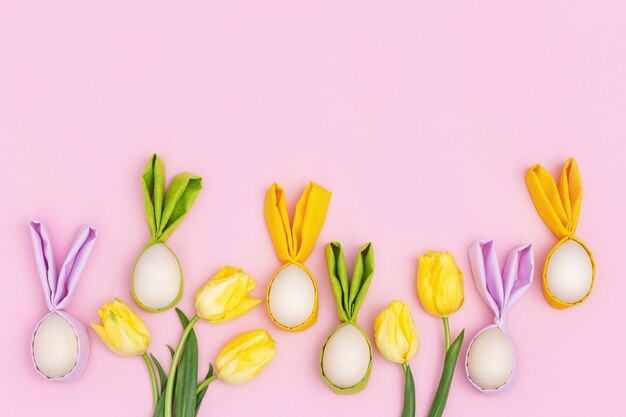 Bright yellow spring flowers tulip and  Easter eggs