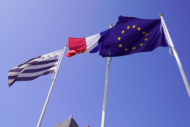 Brittany Breton france and europ eu flag fly black white in a blue sky french