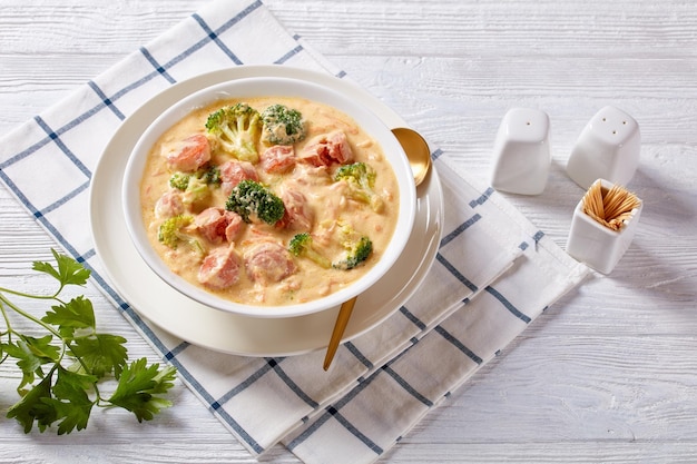 Broccoli Cheddar cheese Sausage Soup in a bowl