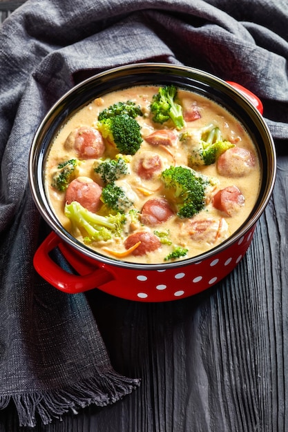 Broccoli Cheddar cheese Sausage Soup in a pot