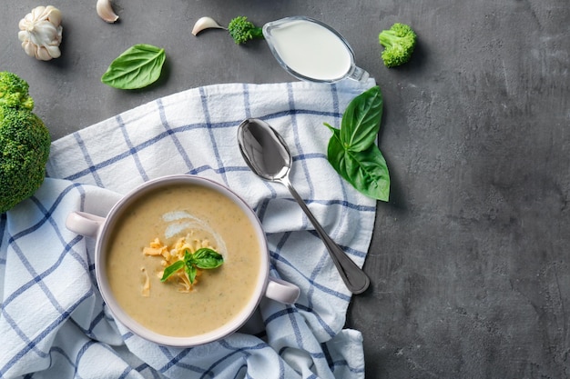 Broccoli cheddar soup in casserole on kitchen table