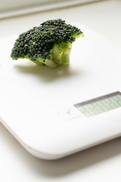 Broccoli on digital kitchen scale