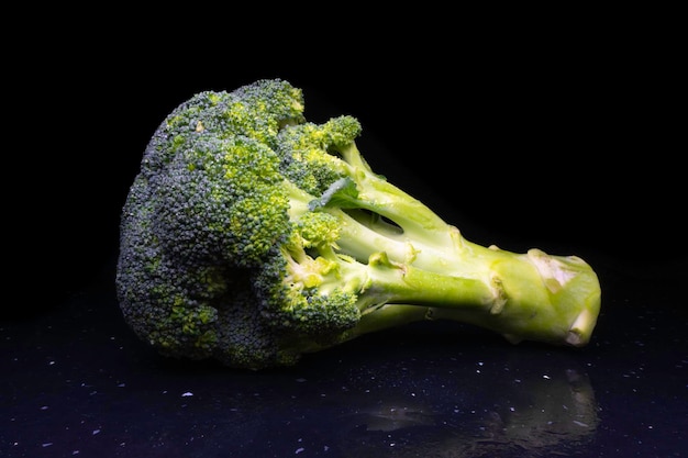 Broccoli fresh on black background