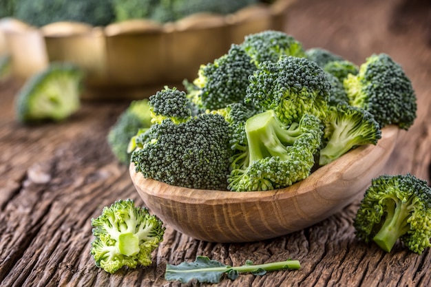 Broccoli.Raw fresh broccoli on old wooden table.