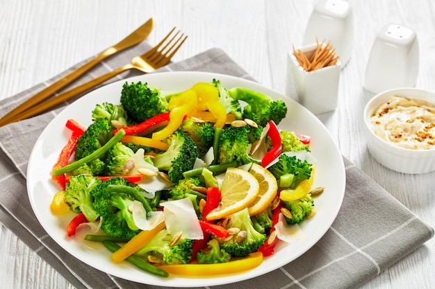 Broccoli sweet pepper green beans salad on a plate