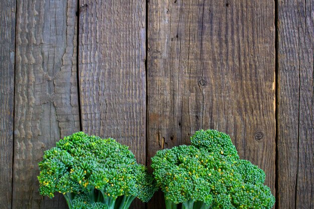 Broccoli on a wooden table background