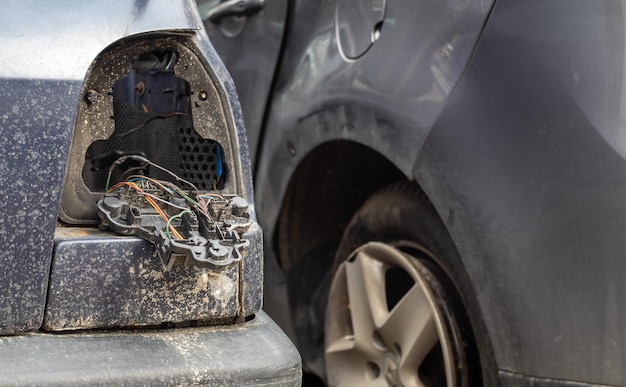 A broken car after an accident without a rear right headlight Car accident concept No tail light with brake light after a minor collision due to dangerous driving and not maintaining a distance